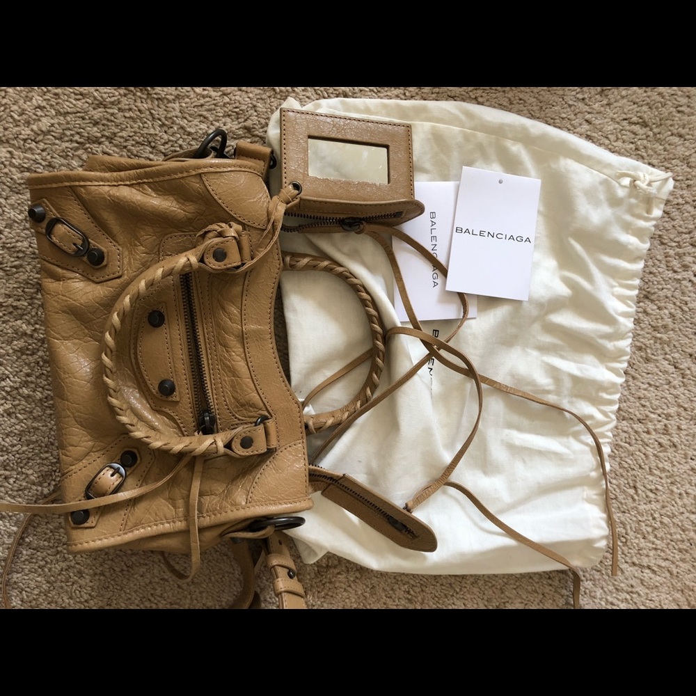 Sold.  Balenciaga mini city like brand new